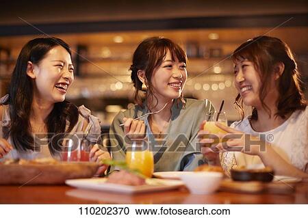Young Japanese friends having fun together View Large Photo Image Stock Image - Young Japanese friends having fun together. Fotosearch