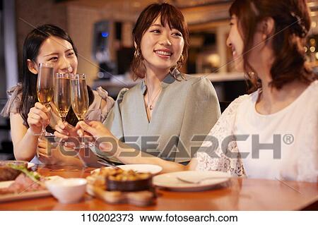 Young Japanese friends having fun together View Large Photo Image Stock Image - Young Japanese friends having fun together. Fotosearch