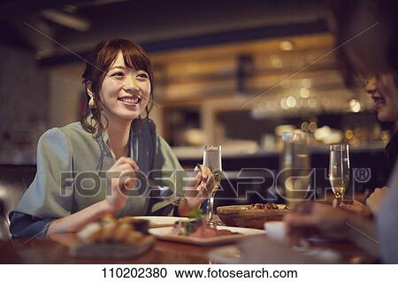 Young Japanese friends having fun together View Large Photo Image Stock Image - Young Japanese friends having fun together. Fotosearch