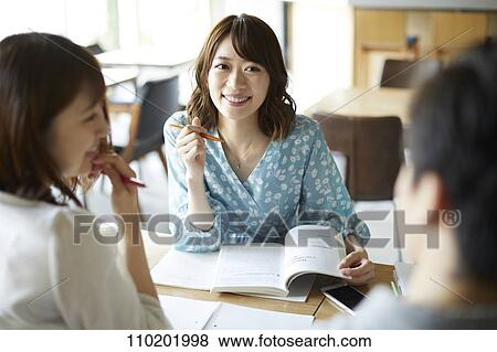 Young Japanese friends having fun together View Large Photo Image Stock Photo - Young Japanese friends having fun together. Fotosearch