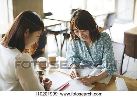 Young Japanese friends having fun together View Large Photo Image Stock Photo - Young Japanese friends having fun together. Fotosearch