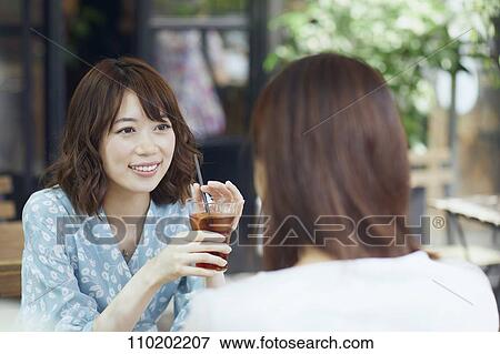 Young Japanese friends having fun together View Large Photo Image Stock Photo - Young Japanese friends having fun together. Fotosearch