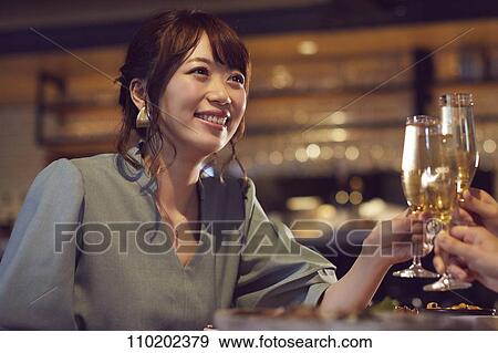 Young Japanese friends having fun together View Large Photo Image Stock Photo - Young Japanese friends having fun together. Fotosearch