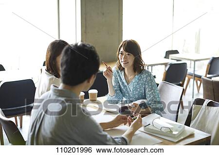 Young Japanese friends having fun together View Large Photo Image Stock Photograph - Young Japanese friends having fun together. Fotosearch