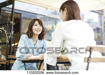 Young Japanese friends having fun together View Large Photo Image Stock Photograph - Young Japanese friends having fun together. Fotosearch