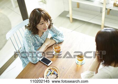 Young Japanese friends having fun together View Large Photo Image Stock Photography - Young Japanese friends having fun together. Fotosearch