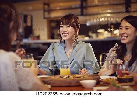 Young Japanese friends having fun together View Large Photo Image Stock Photography - Young Japanese friends having fun together. Fotosearch