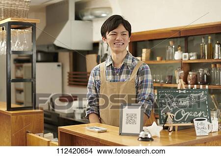 Young Japanese man at a cafe View Large Photo Image Picture - Young Japanese man at a cafe. Fotosearch