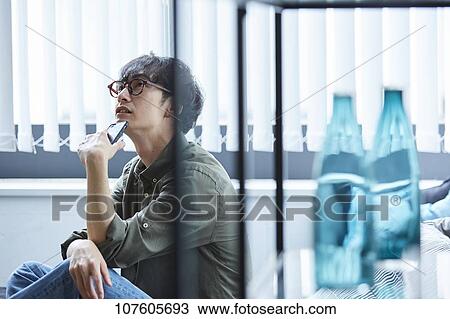 Young Japanese man portrait View Large Photo Image Stock Image - Young Japanese man portrait. Fotosearch