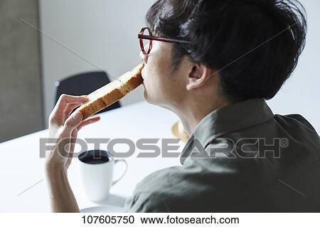 Stock Image - Young Japanese man portrait. Fotosearch