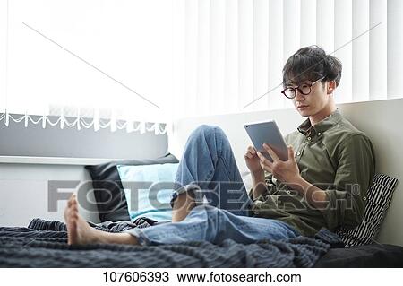 Young Japanese man portrait View Large Photo Image Stock Image - Young Japanese man portrait. Fotosearch