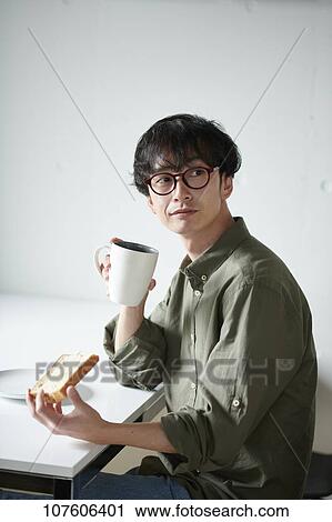 Stock Image - Young Japanese man portrait. Fotosearch