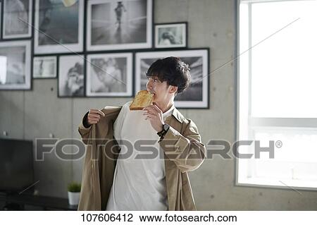 Stock Image - Young Japanese man portrait. Fotosearch