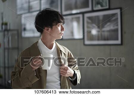 Stock Image - Young Japanese man portrait. Fotosearch