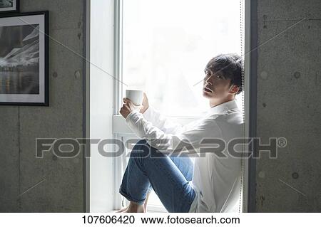 Young Japanese man portrait View Large Photo Image Stock Image - Young Japanese man portrait. Fotosearch