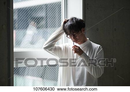 Young Japanese man portrait View Large Photo Image Stock Image - Young Japanese man portrait. Fotosearch
