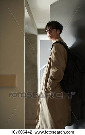 Stock Image - Young Japanese man portrait. Fotosearch