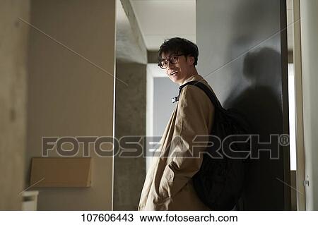 Stock Image - Young Japanese man portrait. Fotosearch