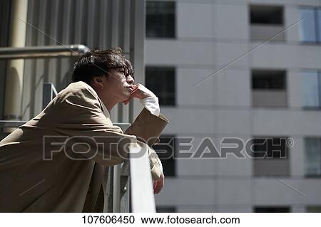 Stock Image - Young Japanese man portrait. Fotosearch