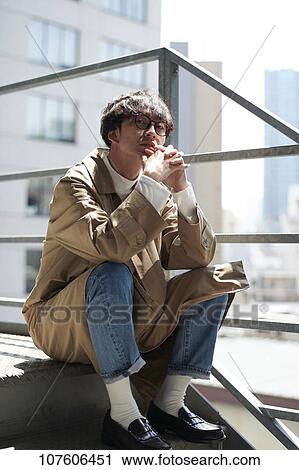 Young Japanese man portrait View Large Photo Image Stock Image - Young Japanese man portrait. Fotosearch