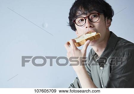 Stock Photo - Young Japanese man portrait. Fotosearch