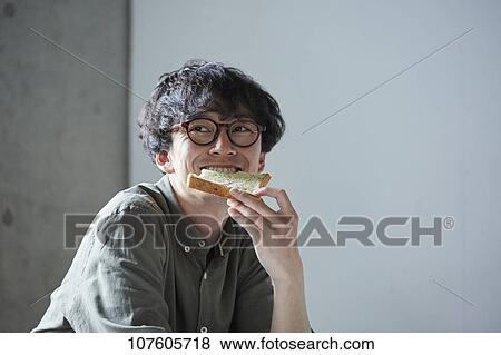 Stock Photo - Young Japanese man portrait. Fotosearch