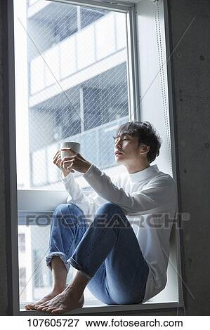 Stock Photo - Young Japanese man portrait. Fotosearch