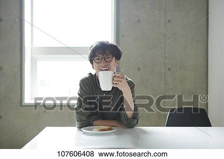 Young Japanese man portrait View Large Photo Image Stock Photo - Young Japanese man portrait. Fotosearch