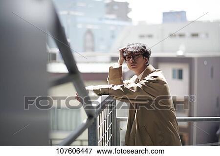 Young Japanese man portrait View Large Photo Image Stock Photo - Young Japanese man portrait. Fotosearch