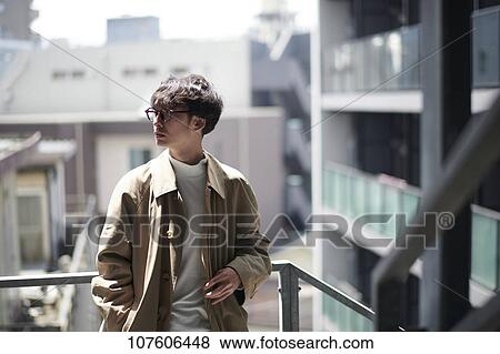 Young Japanese man portrait View Large Photo Image Stock Photo - Young Japanese man portrait. Fotosearch