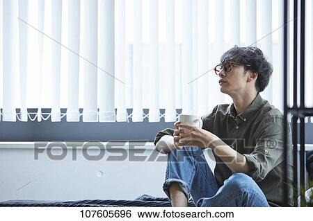 Young Japanese man portrait View Large Photo Image Stock Photograph - Young Japanese man portrait. Fotosearch