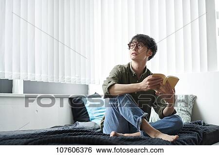 Young Japanese man portrait View Large Photo Image Stock Photograph - Young Japanese man portrait. Fotosearch