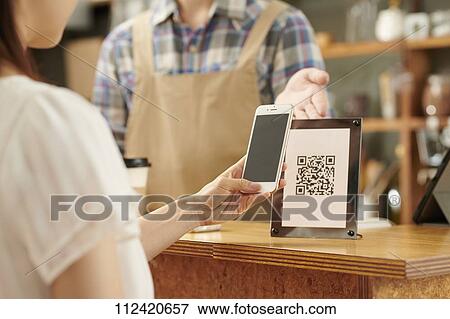 Stock Photo - Young Japanese people at a cafe. Fotosearch