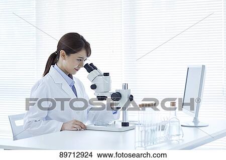 Young Japanese researcher in the lab View Large Photo Image Picture - Young Japanese researcher in the lab. Fotosearch