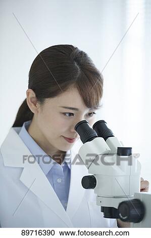 Young Japanese researcher in the lab View Large Photo Image Stock Image - Young Japanese researcher in the lab. Fotosearch