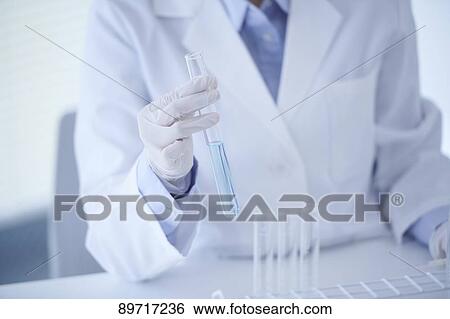 Young Japanese researcher in the lab View Large Photo Image Stock Photograph - Young Japanese researcher in the lab. Fotosearch