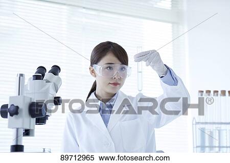 Young Japanese researcher in the lab View Large Photo Image Stock Photography - Young Japanese researcher in the lab. Fotosearch
