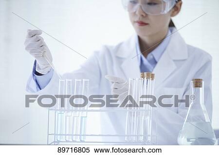 Young Japanese researcher in the lab View Large Photo Image Stock Photography - Young Japanese researcher in the lab. Fotosearch