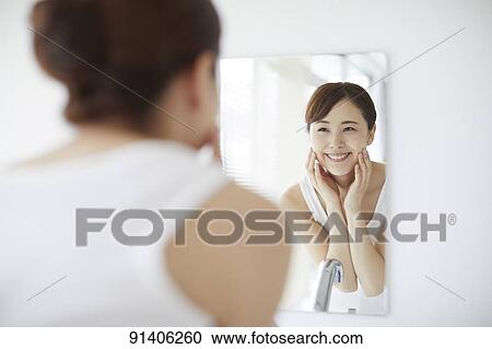 Young Japanese woman at home getting ready in the morning View Large Photo Image Stock Image - Young Japanese woman at home getting ready in the morning. Fotosearch