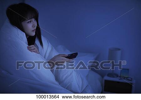 Young Japanese woman in bed View Large Photo Image Picture - Young Japanese woman in bed. Fotosearch