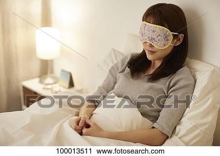 Young Japanese woman in bed View Large Photo Image Stock Image - Young Japanese woman in bed. Fotosearch