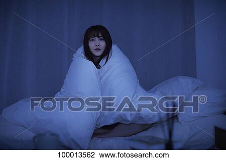 Young Japanese woman in bed View Large Photo Image Stock Image - Young Japanese woman in bed. Fotosearch