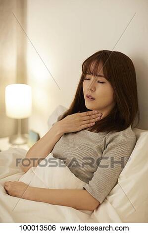 Young Japanese woman in bed View Large Photo Image Stock Photograph - Young Japanese woman in bed. Fotosearch