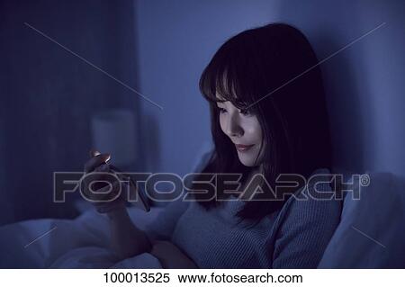 Young Japanese woman in bed View Large Photo Image Stock Photography - Young Japanese woman in bed. Fotosearch
