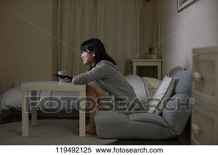 Young Japanese woman in her house View Large Photo Image Stock Photography - Young Japanese woman in her house. Fotosearch