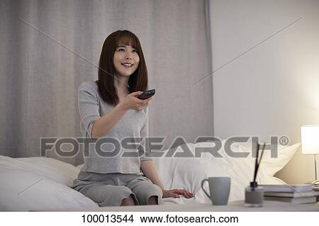 Young Japanese woman in the bedroom View Large Photo Image Picture - Young Japanese woman in the bedroom. Fotosearch
