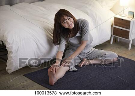 Young Japanese woman in the bedroom View Large Photo Image Stock Photo - Young Japanese woman in the bedroom. Fotosearch
