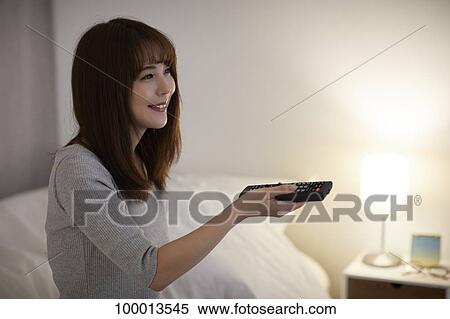 Young Japanese woman in the bedroom View Large Photo Image Stock Photography - Young Japanese woman in the bedroom. Fotosearch