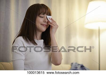 Young Japanese woman in the living room View Large Photo Image Stock Photography - Young Japanese woman in the living room. Fotosearch