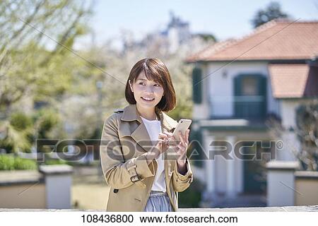Young Japanese woman portrait View Large Photo Image Stock Image - Young Japanese woman portrait. Fotosearch